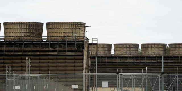 Cooling towers release heat generated by boiling water reactors at Xcel Energy's Nuclear Generating Plant on Oct. 2, 2019, in Monticello, Minnesota. Radioactive water leaked from the plant for the second time. The company said there's no danger to the public.