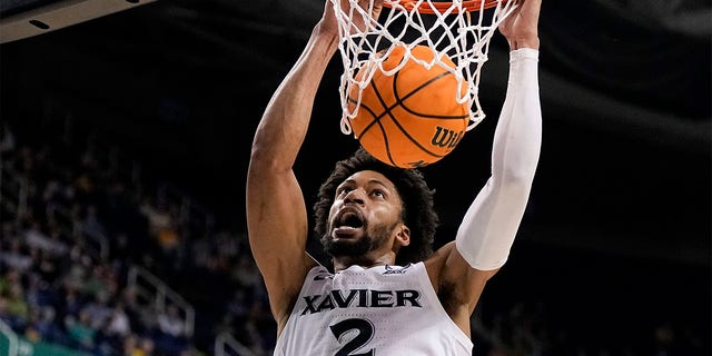 Xavier forward Jerome Hunter dunks against Kennesaw State during the first half of a first-round game in the NCAA Tournament Friday, March 17, 2023, in Greensboro, N.C.
