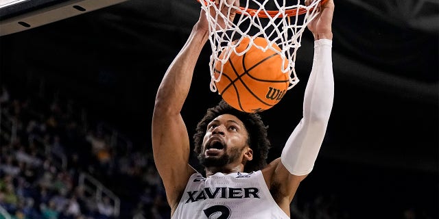 Xavier forward Jerome Hunter dunks against Kennesaw State during the first half of a first-round game in the NCAA Tournament Friday, March 17, 2023, in Greensboro, N.C.