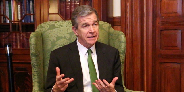 Democratic North Carolina Gov. Roy Cooper speaks to The Associated Press in a year-end interview at the Executive Mansion in Raleigh, N.C., Dec. 14, 2022.