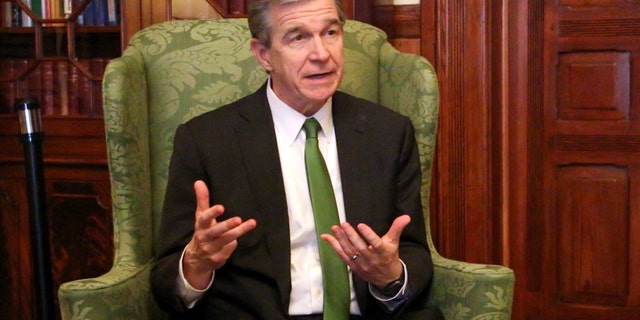 Democratic North Carolina Gov. Roy Cooper speaks to The Associated Press in a year-end interview at the Executive Mansion in Raleigh, N.C., Dec. 14, 2022.