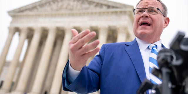 North Carolina House Speaker Tim Moore speaks in front of the Supreme Court in Washington, Dec. 7, 2022.