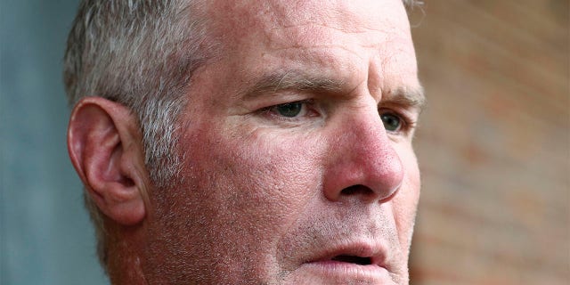 Former NFL quarterback Brett Favre speaks to the media in Jackson, Miss., Oct. 17, 2018.
