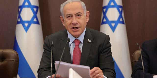 Israeli Prime Minister Benjamin Netanyahu attends the weekly cabinet meeting at the prime minister's office in Jerusalem on March 19, 2023. Netanyahu's government repealed a 2005 act that led to Israeli forces withdrawing from the occupied West Bank.
