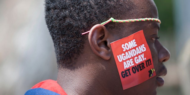 A Ugandan man is seen during the third Annual Lesbian, Gay, Bisexual and Transgender (LGBT) Pride celebrations in Entebbe, Uganda on Aug. 9, 2014.