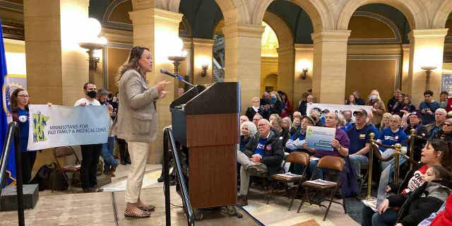 Democratic Minnesota state Sen. Alice Mann speaks at a rally in support of creating a paid family and medical leave system in the state on March 21, 2023, in St. Paul, Minnesota. Mann is the lead author of the bill in the Senate.