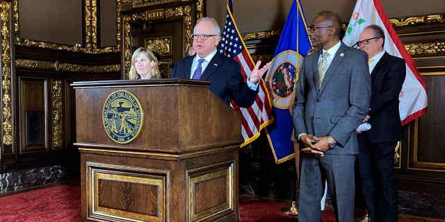 Democratic Minnesota Gov. Tim Walz and Democratic legislative leaders announce an agreement regarding the state's broad budget target on March 21, 2023, in St. Paul, Minnesota. The agreement on the broad budget targets adds up to nearly $17.9 billion in new spending.