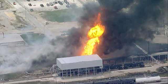 Smoke fills the air from a plant fire in Pasadena, Texas, on March 22. 2023. Officials are investigating the chemical plant explosion that injured at least one person.