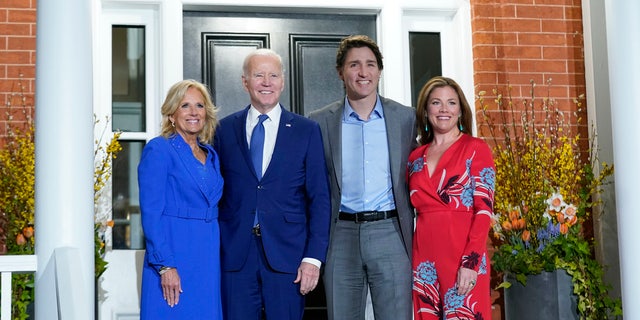 President Joe Biden and first lady Jill Biden pose for photos with Canadian Prime Minister Justin Trudeau and his wife Sophie Gregoire Trudeau at Rideau Cottage, Thursday, March 23, 2023, in Ottawa, Canada.
