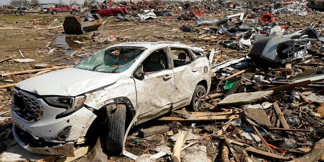 A vehicle awaits removal Saturday, March 25, 2023 after it was destroyed by a Friday night tornado that struck Rolling Fork, Mississippi. Emergency officials in Mississippi say several people were killed by tornadoes that swept through the state on Friday night, destroying buildings and knocking out power as storms produced hail the size of golf balls that ripped through several southern states.
