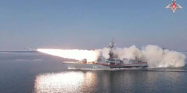 In this photo made from video provided by the Russian Defense Ministry Press Service on Tuesday, March 28, 2023, a Russian navy boat launches an anti-ship missile test in the Peter The Great Gulf in the Sea of Japan. 