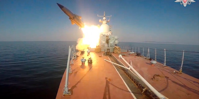 In this photo made from video provided by the Russian Defense Ministry Press Service on Tuesday, March 28, 2023, a Russian navy boat launches an anti-ship missile test in the Peter The Great Gulf in the Sea of Japan. 