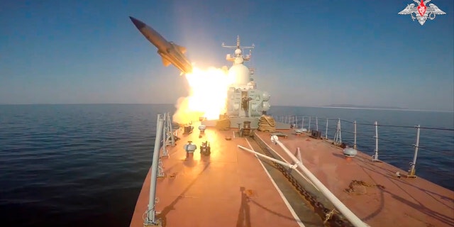 In this photo made from video provided by the Russian Defense Ministry Press Service on Tuesday, March 28, 2023, a Russian navy boat launches an anti-ship missile test in the Peter The Great Gulf in the Sea of Japan. 