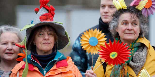 Swiss seniors are protesting outside the European Court of Human Rights on March 29, 2023, in Strasbourg, France. A group of Swiss seniors are taking their government to court to demand more serious action towards combating climate change.
