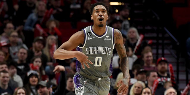 Sacramento Kings guard Malik Monk reacts after hitting a shot against the Trail Blazers in Portland, Wednesday, March 29, 2023. The Kings won 120-80.