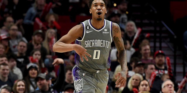 Sacramento Kings guard Malik Monk reacts after hitting a shot against the Trail Blazers in Portland, Wednesday, March 29, 2023. The Kings won 120-80.