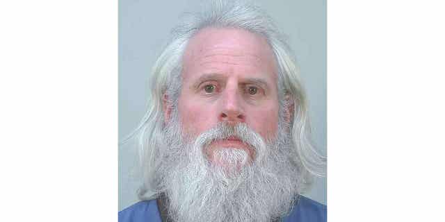 Michael A.  Yacker, above, pleaded guilty to threatening a county official under an agreement with prosecutors.  Yacker also allegedly threatened Governor Tony Evers and other officials.