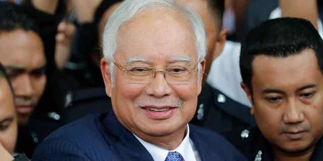 Former Malaysian Prime Minister Najib Razak gets into a car after appearing in court in Kuala Lumpur, Malaysia April 3, 2019.  On March 31, 2023, Malaysia's highest court refused to review its decision to uphold Razak's bribery conviction.