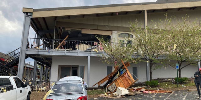 A building is damaged after a severe storm in Little Rock, Ark., Friday, March 31, 2023.