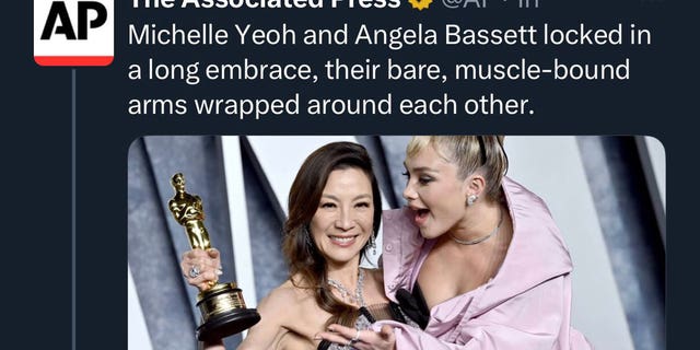 A deleted Associated Press tweet reading, "Michelle Yeoh and Angela Bassett locked in a long embrace, their bare, muscle-bound arms wrapped around each other."