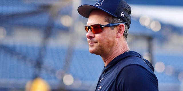 Aaron Boone #17 of the New York Yankees looks on during batting practice prior to a Grapefruit League Spring Training game against the Pittsburgh Pirates at George M. Steinbrenner Field on March 06, 2023 in Tampa, Florida.