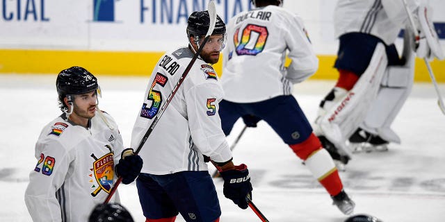 Florida Panthers defenseman Aaron Ekblad, #5, warm up while wearing a Pride Night jersey before playing the Toronto Maple Leafs, Thursday, March 23, 2023, in Sunrise, Florida.