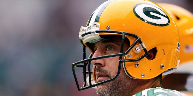 Aaron Rodgers, #12 of the Green Bay Packers, looks on against the Miami Dolphins during the first half of the game at Hard Rock Stadium on Dec. 25, 2022 in Miami Gardens, Florida.