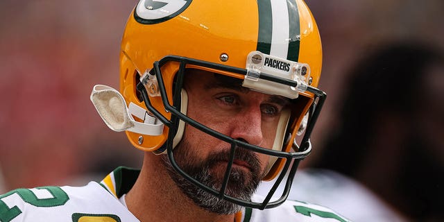 Aaron Rodgers, #12 of the Green Bay Packers, looks on before the game against the Washington Commanders at FedExField on October 23, 2022 in Landover, Maryland.