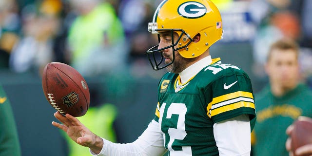 Packers quarterback Aaron Rodgers warms up before a Minnesota Vikings game at Lambeau Field on January 1, 2023, in Green Bay, Wisconsin.