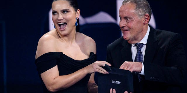 Adriana Lima and Andres Cantor prepare to announce the winner of the fan award during the Best FIFA Football Awards 2022 on Feb. 27, 2023, in Paris.