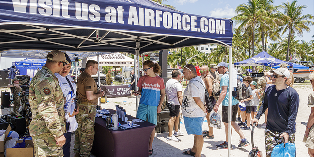 Air Force recruiters are seen at the Hyundai Air &amp; Sea Show in Miami Beach, Florida, in May 2022.