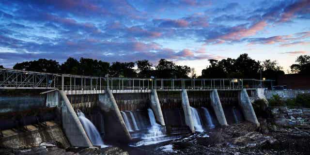 The Weston Dam holds back the Kennebec River on Sept. 14, 2021, in Skowhegan, Maine. The federal government ruled on March 20, 2023, that wild Atlantic salmon can coexist with dams on a Maine rivers.