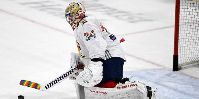 Florida Panthers goalie Alex Lyon, #34, warms up while wearing a Pride Night hockey jersey before playing against the Toronto Maple Leafs, Thursday, March 23, 2023, in Sunrise, Florida.