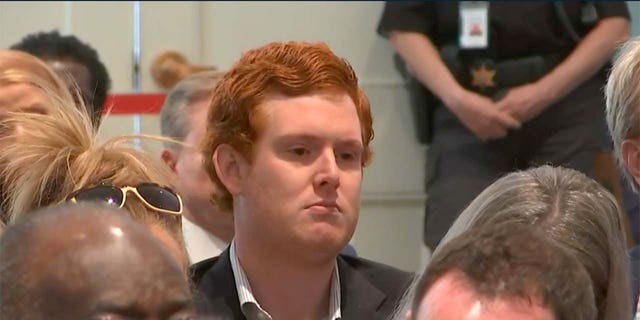 Buster Murdaugh listens to Alex Murdaugh's sentencing at the Colleton County courthouse Walterboro, South Carolina on Friday, March 3, 2023. Alex Murdaugh was found guilty on all counts of murdering his wife and son.