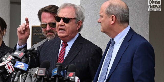 Defense attorney Dick Harpootlian speaks to the media alongside Alex Murdaugh’s defense team after their client was handed a double life sentence Friday, March 3, 2023. Murdaugh was convicted Thursday of the murders of his wife, Maggie, and son, Paul in 2021.