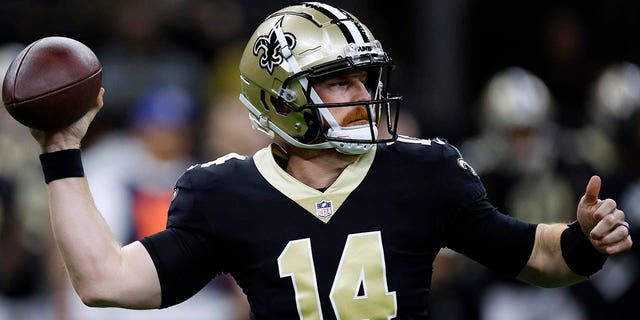 Andy Dalton of the New Orleans Saints throws during the third quarter against the Carolina Panthers at Caesars Superdome Jan. 8, 2023, in New Orleans.