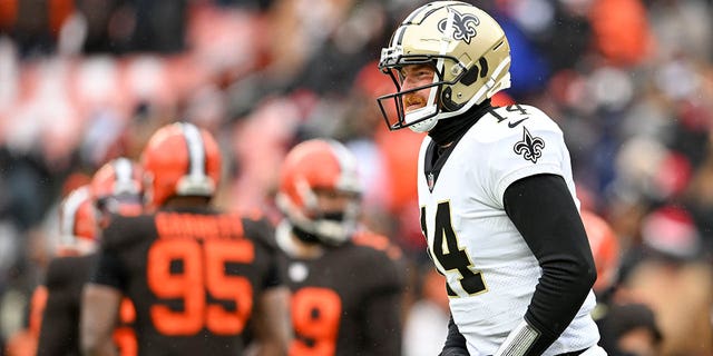 Andy Dalton of the New Orleans Saints during the first half against the Cleveland Browns at FirstEnergy Stadium Dec. 24, 2022, in Cleveland.