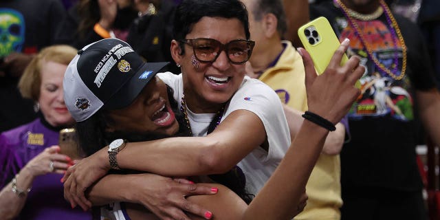 Angel Reese, #10 of the LSU Lady Tigers, celebrates after defeating the Miami Hurricanes 54-42 in the Elite Eight round of the NCAA Women's Basketball Tournament at Bon Secours Wellness Arena on March 26, 2023 in Greenville, SC South.