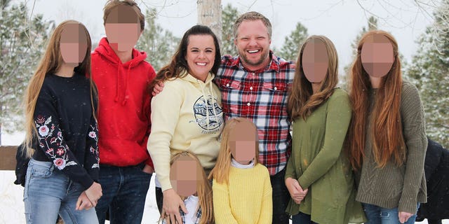 Colorado dentist James Craig and his wife, Angela, in a family portrait. James has been charged with first-degree murder for allegedly poisoning his wife.