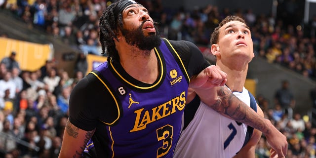 Anthony Davis (3) of the Los Angeles Lakers boxes out during a game against the Dallas Mavericks March 17, 2023, at Crypto.Com Arena in Los Angeles.