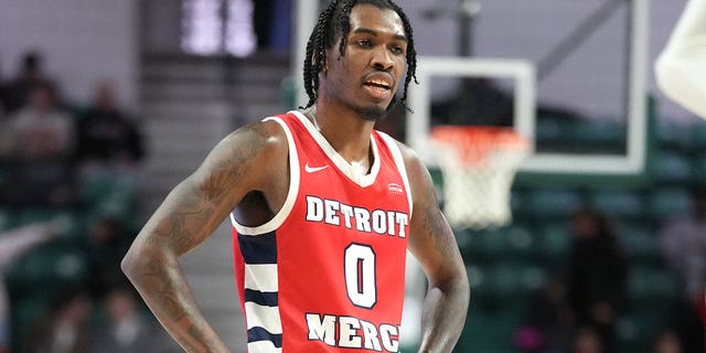 Antoine Davis, #0 of the Detroit Mercy Titans, looks on during a college basketball game against the Eastern Michigan Eagles at the George Gervin GameAbove Center on Dec. 18, 2022 in Ypsilanti, Michigan.