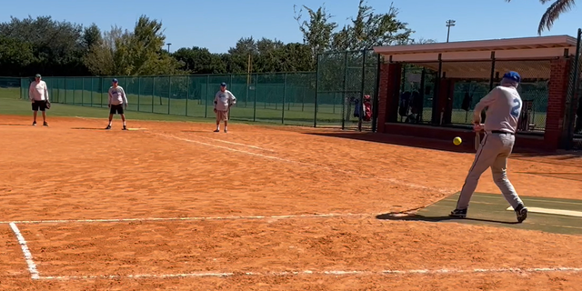 Dale Appleby, 92, shown at right, still gets on base during his softball games in The Villages, Florida.