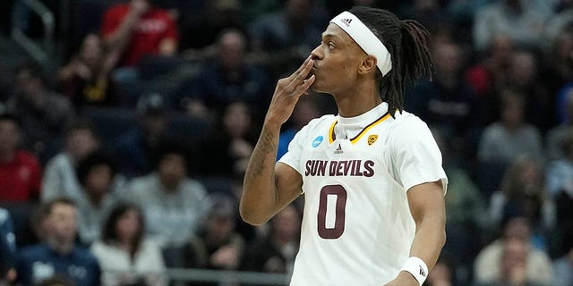 Arizona State's DJ Horne reacts after hitting a three-pointer during the first half of a First Four college basketball game against Nevada in the NCAA men's basketball tournament, Wednesday, March 15, 2023, in Dayton, Ohio. 