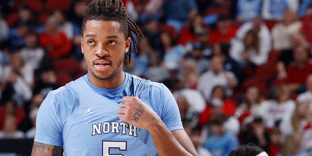 North Carolina Tar Heels forward Armando Bacot, #5, looks on during a college basketball game against the Louisville Cardinals on January 14, 2023 at KFC Yum!  Center in Louisville, Kentucky.