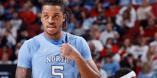 North Carolina Tar Heels forward Armando Bacot, #5, looks on during a college basketball game against the Louisville Cardinals on January 14, 2023 at KFC Yum!  Center in Louisville, Kentucky.