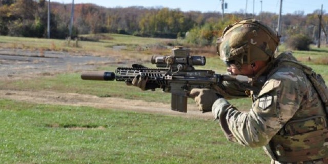 A soldier fires the Army's XM7 rifle, which is still being tested.