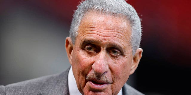 Atlanta Falcons owner Arthur Blank on the field before the game against the Arizona Cardinals at Mercedes-Benz Stadium on January 1, 2023 in Atlanta.