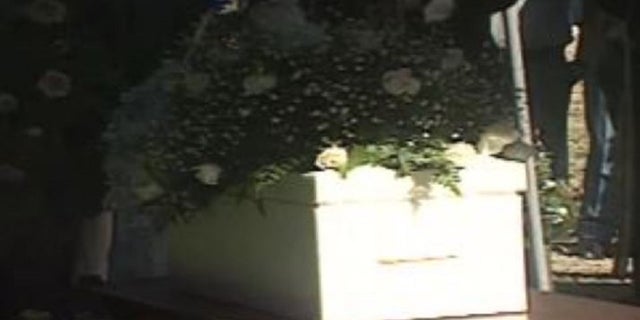 A funeral is held for a newborn baby boy, whose body was found stabbed to death in the restroom of Oglethorpe House in 1996 on the University of Georgia campus.