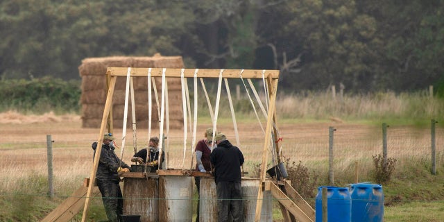 Archaeologists turned up searching for remains in a field in Arundel in 2019. The remains of American airmen killed when their bomber crashed were discovered on an English farm and officially identified after 79 years. 