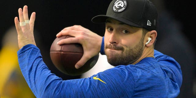 Los Angeles Rams number 17 Baker Mayfield warms up for the game against the Denver Broncos at SoFi Stadium on December 25, 2022 in Inglewood, California.